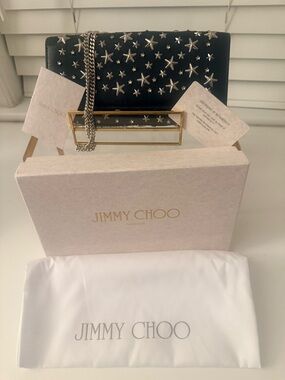 . Jimmy Choo: Milla Black Star-Studded Leather Chain Clutch Wallet